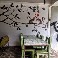 Cool murals downstairs at The Cup Resto in Abang