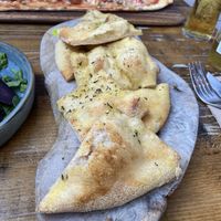 Garlic bread. Chewy and flavourless and wouldn’t add vegan cheese   at Zizzi in Bath