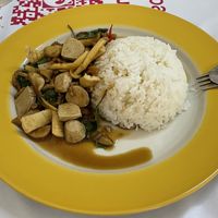 Fried basil with vegan pork sausage, squid and salted fish.  at Raan J Koh in Loei