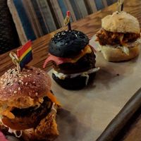 "Rainbow Sliders" - black bean and sweet potato in pink brioche, pulled jackfruit and avocado in white brioche, cheese veggies burger in charcoal brioche
 at The Apple Tree in London