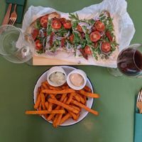 Flambeed bread and sweet potato fries at Veganda in Warsaw