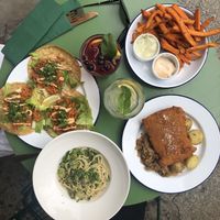Vegan cutlet, vegan tacos, fava beans spaghetti, sweet potatoe fries. at Veganda in Warsaw