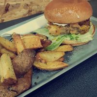 Free the Chick burger and garlic and parsley fries 🤤 at Take A Veg in Dublin