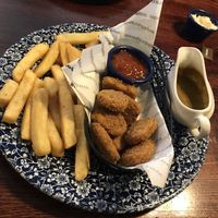 Quorn nuggets, chips and a side of curry sauce.   at The Admiral Byng in Potters Bar