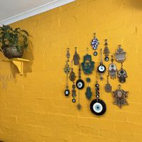 Evil eye wall decoration   at Za'atar in Bellingen