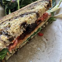 Deluxe chicken sandwich with side of kale salad  at VegOut in Bethlehem