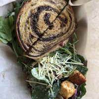 Deluxe chicken sandwhich with side of kale salad  at VegOut in Bethlehem