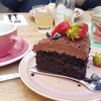 Vegan chocolate cake and oatmilk cappuccino at Coffeelicious Bakery in Dordrecht