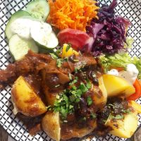 Goulash with seitan, plums and nectarines at House of Seitan in Gdansk