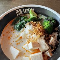 Spicy Creamy Vegan Ramen (added broccoli)  at JINYA Ramen Bar in Vancouver