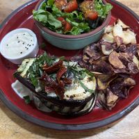 Eggplant lasagna with salad and hummus and veggie chips  at Camellias Tea in Guayaquil