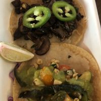 Mushroom and Vegetable tacos with vegan cheese  at Tazón in Fullerton