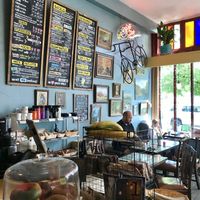 local artwork on walls and plenty of seating at Just Bob in Portland