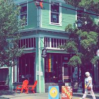 Entrance and outdoor seating in summer at Just Bob in Portland