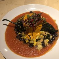 Vegan Chile Relleno stuffed with quinoa, black beans, zucchini, and corn topped with cashew queso   at Blue Heron Restaurant in Santa Fe