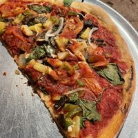 Veggie pizza, no cheese, add pineapple and garlic   at Prison Street Pizza in Lahaina