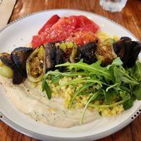 Mushroom skewer with pearl couscous and tahini sauce at Naim  in Paddington
