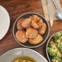 Crispy potatoes  at Naim  in Paddington