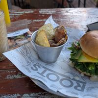 Vegan burger (hummus and beetroot), decaf oat frappachino at Roots in San Pedro De Atacama
