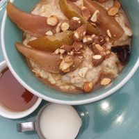 Porridge with stewed fruit at Feedback Cafe in Yarraville