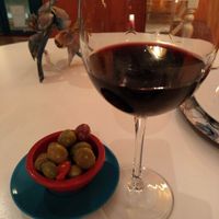 Wine with comp olives at Restaurante Amaltea in Cordoba