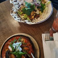 Vegan Shakshuka and planted chicken shawarma at Grand Café Lochergut in Zurich