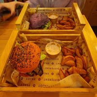 The pink purple is the classic flower Burger with lentil patties and the orange is the eggplant with a chikpea patty
Various fries are offered and Local soda or beer aswell at Flower Burger in Bari