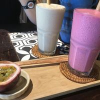 Passion fruit + dragon fruit smoothie and banana, oak milk + dates smoothie  at Nourish in Hoi An