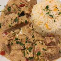 Seitan com arroz de cenoura at Donna Veggie in Guimaraes