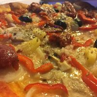 No. 4 + olives and sundried tomatoes and vegan cheese.
They have it but not marked on the menu - ask! at Azzurra Nordkraft in Aalborg