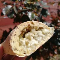 Empanada cebolla caramelizada, queso vegano sin gluten / gluten-free caramelized onions and vegan cheese empanada at Veggie Lunch in Santiago