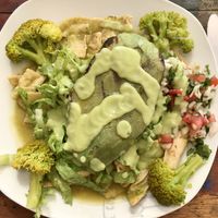 Most delicious Chilaquiles with some veggies (which ever he has available ) at Maya Papaya in Oaxaca