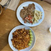 Segundos del menú del día: migas con chorizo vegano y legimbreta con tomate y patatas  at La Piparra in Bilbao