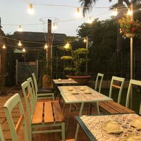 Garden seating at Bep Chay Co May in Vung Tau