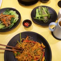 Fried noodles, bok choi and Thai noodle soup at Fast Vegans in Ho Chi Minh City