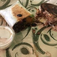 Sweet potato burrito with Kip Sauce on the side and Reuben sandwich on the right!  Yummy! at Tickled Tummy in Paris