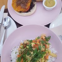 Christmas menu: coconut veg curry and quineo burger. at Pura Vida in Gran Canaria