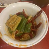 The cleaver smashed cucumber is in a sweet chili garlic sesame soy vinaigrette. These are probably the best cucumbers that I have ever had. They are served nicely chilled at Very Fresh Noodles in New York City