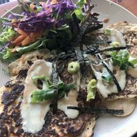 okonomiyaki (Japanese pancake) - served burnt , bottom is even more burnt than the tops at Plant Based Wholefoods in Katoomba