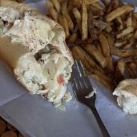 Vegan lobster roll with fries.  at Cobra Cabana in Richmond