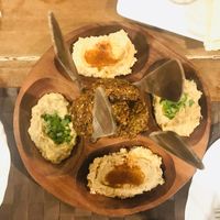 Plate with hummus and falafel  at Káfila in Jericoacoara