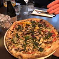 Pizza Veggy with vegan mozzarella, veggies and green pesto  at MammaMia in The Hague