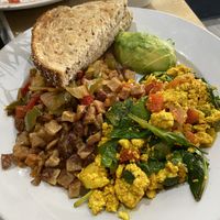 Tofu breakfast scramble with home fries and multigrain toast  at Green Eggs Cafe - Midtown Village in Philadelphia