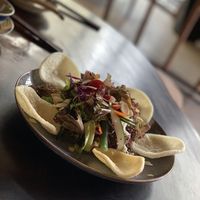 Mango and fresh coconut salad at Oneness Chay in Hanoi