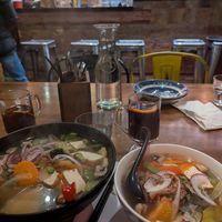 Vegan noodle soup (XL to the left, normal to the right). And mulled wine. YUM at Saigon Kingdom - Beach St in Queenstown