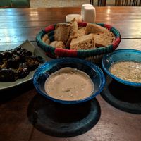 Stuffed eggplant, dips and bread at Sofra in Luxor