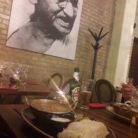 The restaurant interior and chana masala at Cafe Mumbai in Aalborg