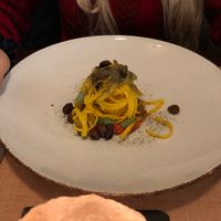 Carrot tagliatelle on a spicy tomato sauce with olives at Seiperdue in Rome
