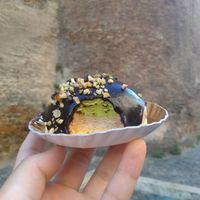 The inside of the vegan individual (4,50euros) pistacchio and almond cream + biscuit+ chocolate cover at Senza Pensieri in Rome