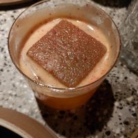 Maracuyá sour, bourbon, aperitivo liviano, cordial de pomelo rojo. at SACRO in Buenos Aires